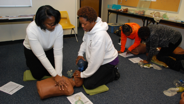 Students are training and learning how to perform CPR
