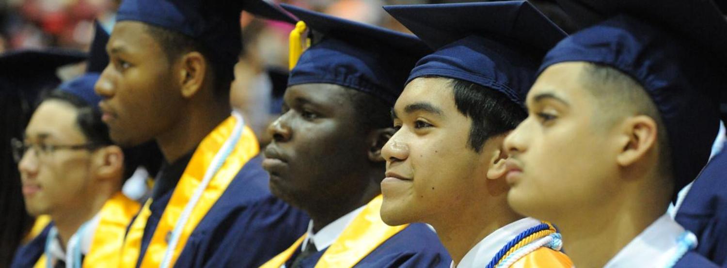 5 PGCC Students Standing at Commencement
